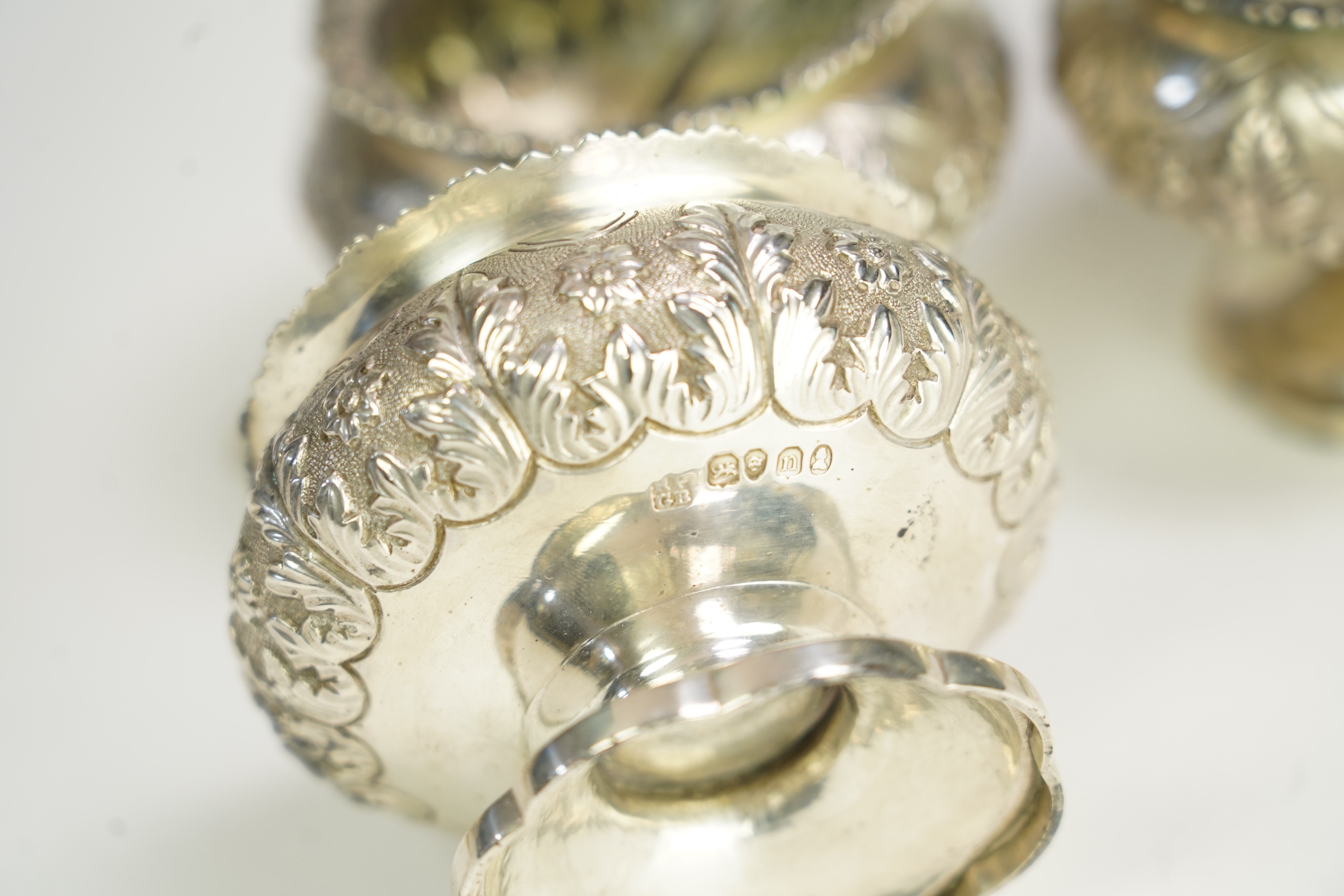 A set of four George IV silver circular pedestal salts by Richard Pearce & George Burrows